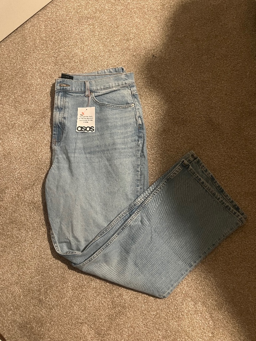 ASOS DESIGN mid rise flare jeans in light vintage wash